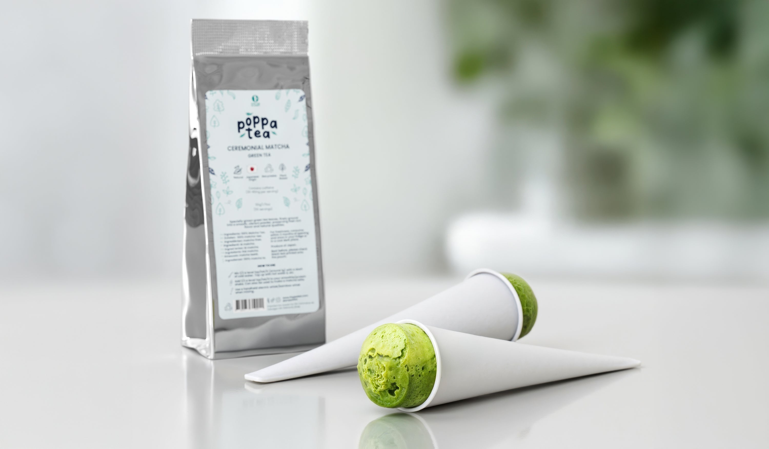 Matcha Chia Seed Ice Lollies in a white quick release tube with a poppatea refill pouch in the background 