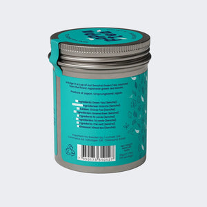 sencha green tea canister with teal label and black lid on a white background
