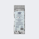 A silver refill pouch of Poppa Tea Ceremonial Matcha - koku edition, shown from the back on a clean grey background.