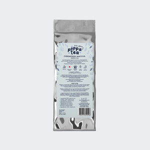 A silver refill pouch of Poppa Tea Ceremonial Matcha - koku edition, shown from the back on a clean grey background.