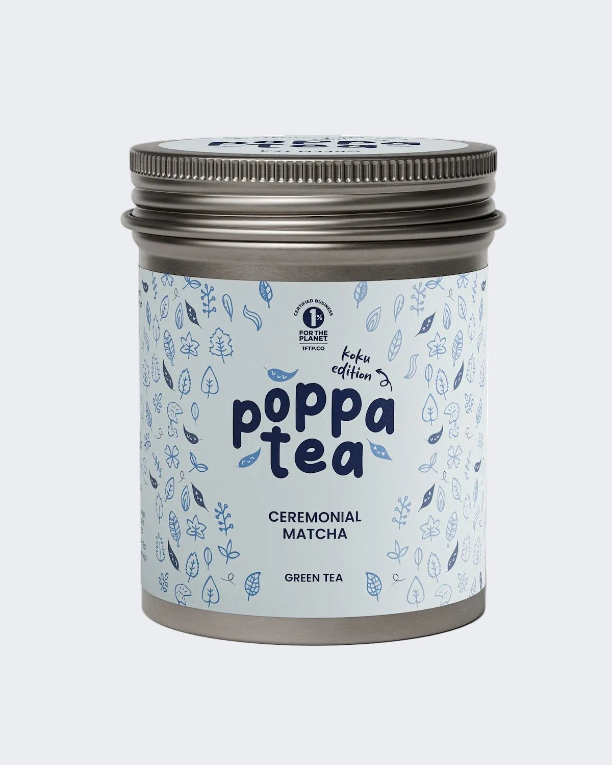 A tin of Poppa Tea koku edition ceremonial matcha green tea, featuring a light blue label with blue leaf illustrations and a metallic silver lid, set against a plain white background.