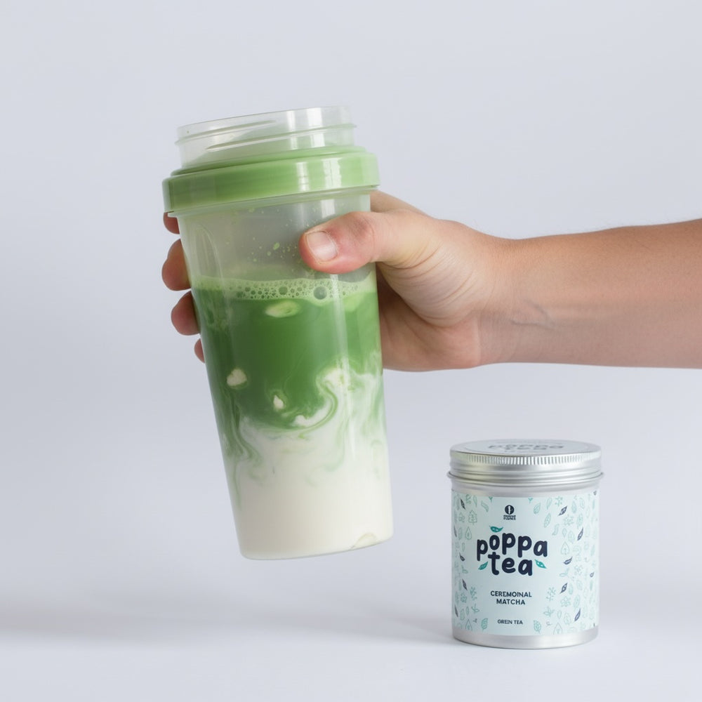 matcha tea being mixed into a protein shake in a flask