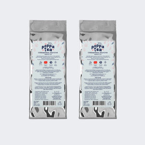 Two packages of Poppa Tea heritigae edition matcha on a white background