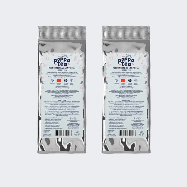 Two packages of Poppa Tea heritigae edition matcha on a white background